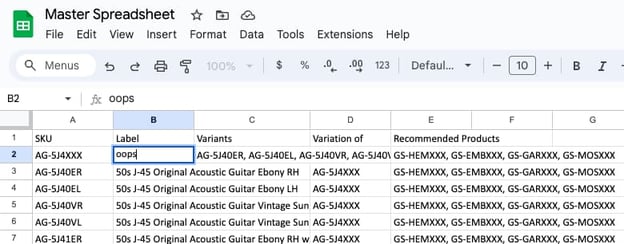 A spreadsheet containing product information and one cell with the word "oops" being typed into it